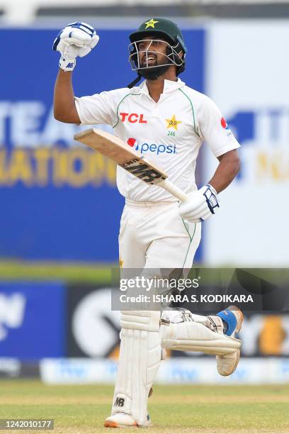 Pakistans Abdullah Shafique celebrates after Pakistan won by 4 wickets at the end of the final day of play of the first cricket Test match between...