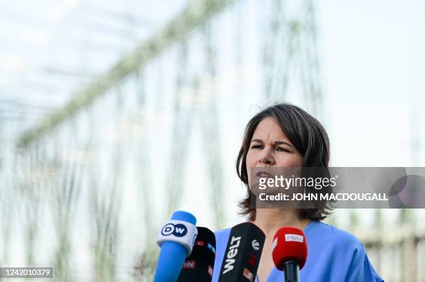 German Foreign Minister Annalena Baerbock gives a statement to the press after her visit to power relay station of the transmission system operator...