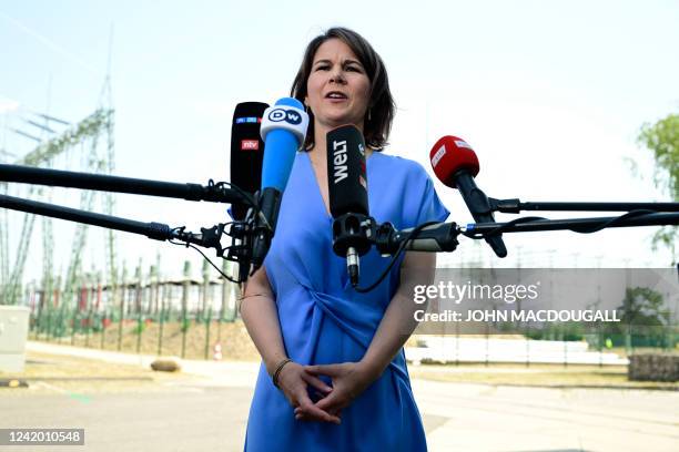 German Foreign Minister Annalena Baerbock gives a statement to the press after her visit to power relay station of the transmission system operator...