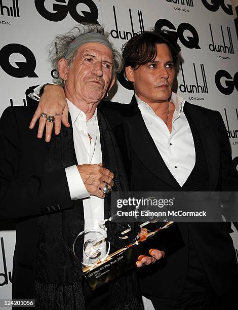 Keith Richards, Johnny Depp at the GQ Men Of The Year Awards at The Royal Opera House on September 6, 2011 in London, England.