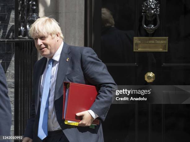 British Prime Minister Boris Johnson leaves 10 Downing Street for his weekly Prime Minister's Questions appearance in the House of Commons in London,...