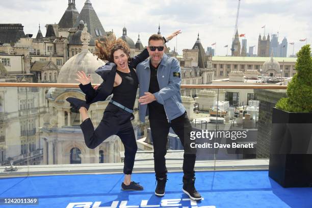 Kelly McCormick and David Leitch attend the "Bullet Train" photocall at Corinthia London on July 20, 2022 in London, England.
