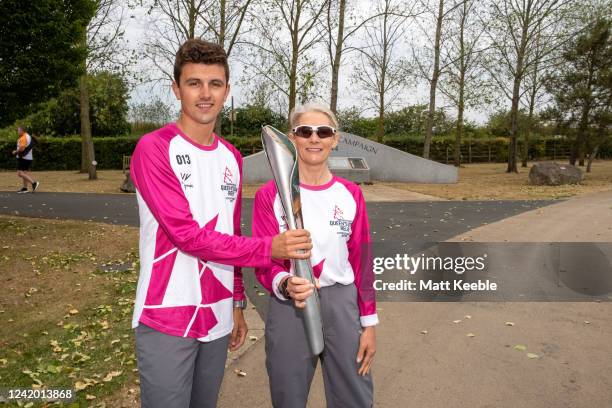 Callum Chadwick and Samantha Johns take part in The Queen's Baton Relay as it visits the National Memorial Arboretum as part of the Birmingham 2022...
