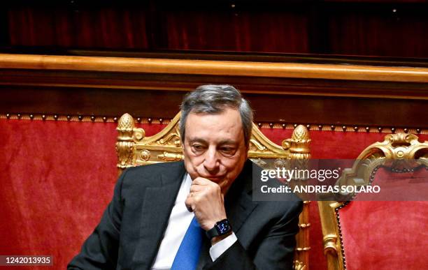 Italy's Prime Minister Mario Draghi looks on during the debate on government crisis following his resignation the week before, at the Senate in Rome...