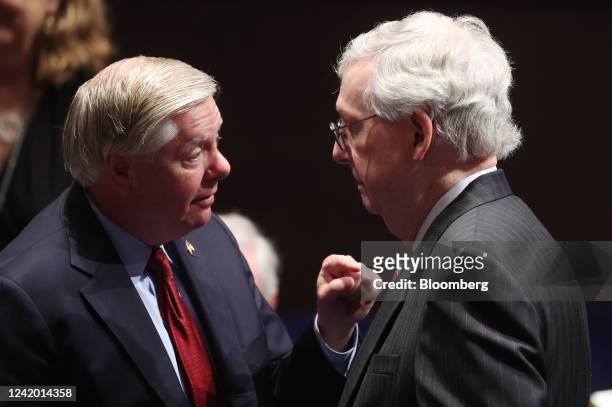 Senator Lindsey Graham, a Republican from South Carolina, left, speaks to Senate Minority Leader Mitch McConnell, a Republican from Kentucky, before...