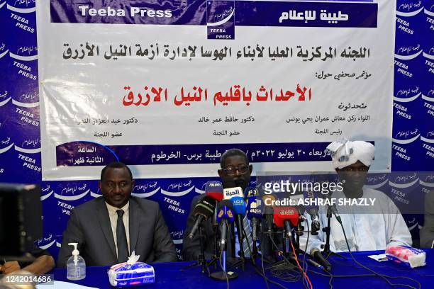 Members of Sudan's Hausa Central Committee Hafez Omar Khaled, General Maash Yahya Yones, Abdulaziz al-Noor hold a press conference in Khartoum on...