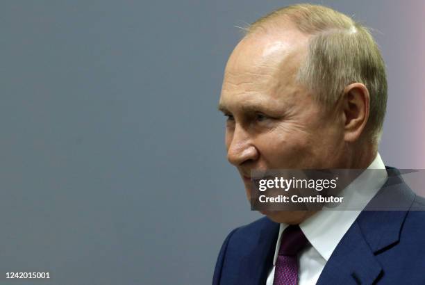 Russian President Vladimir Putin smiles during the Powerful Ideas For New Times Forum on July 20, 2022 in Moscow, Russia. Putin takes part in the...