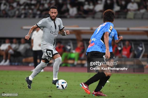Neymar Junior dribbles the ball during the preseason friendly match between Paris Saint-Germain and Kawasaki Frontale at National Stadium on July 20,...
