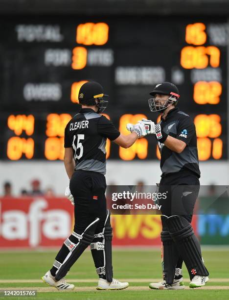 Belfast , United Kingdom - 20 July 2022; New Zealand batsmen Dane Cleaver, left, and Daryl Mitchell during the Men's T20 International match between...