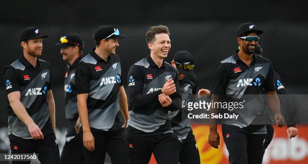 Belfast , United Kingdom - 20 July 2022; Michael Bracewell of New Zealand, centre, celebrates with teammates after their side's victory in the Men's...