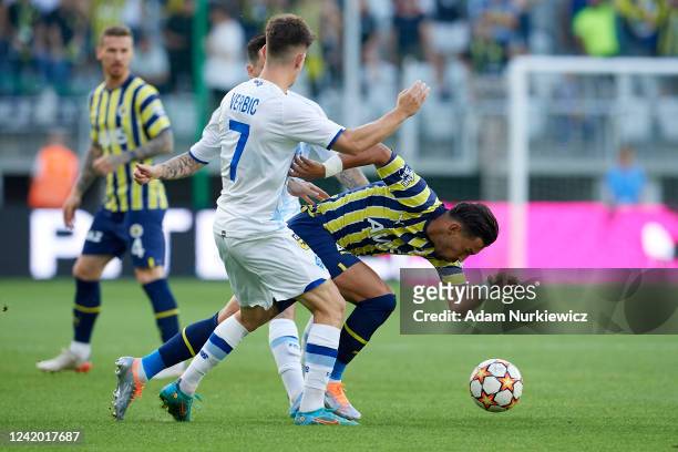 Irfan Can Kahveci of Fenerbahce fights for the ball with Benjamin Verbic of Dynamo Kiev during the UEFA Champions League Second Qualifying Round...