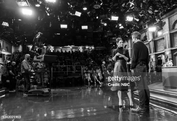Episode 1319 -- Pictured: Actress Katie Holmes talk with host Seth Meyers during a commercial break on July 20, 2022 --