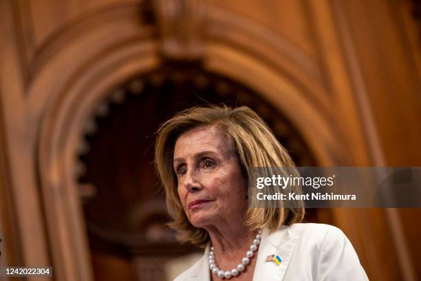 Speaker of the House Nancy Pelosi listens to speakers during an event in the Rayburn Room on Capitol Hill, Wednesday, July 20, 2022 in Washington,...