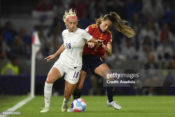 Chloe Kelly of England and Ona Batlle of Spain compete for the ball during the UEFA Women's Euro England 2022 Quarter Final match between England and...