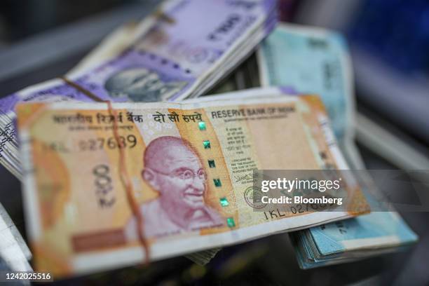 Indian rupee banknotes arranged for a photograph at a general store in Mumbai, India, on Wednesday, July 20, 2022. The rupee slid to all-time low of...