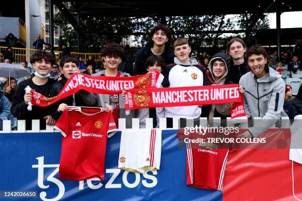Manchester United fans watch an open training session at the WACA stadium in Perth on July 21 ahead of the tour match between Manchester United and...