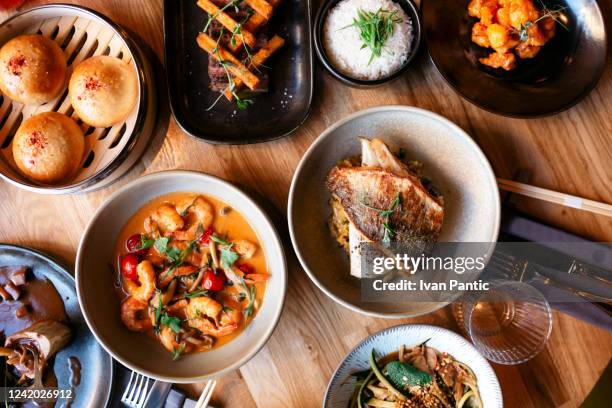 view from above of a mix of south east asia, typical asian food - serving dish stock pictures, royalty-free photos & images
