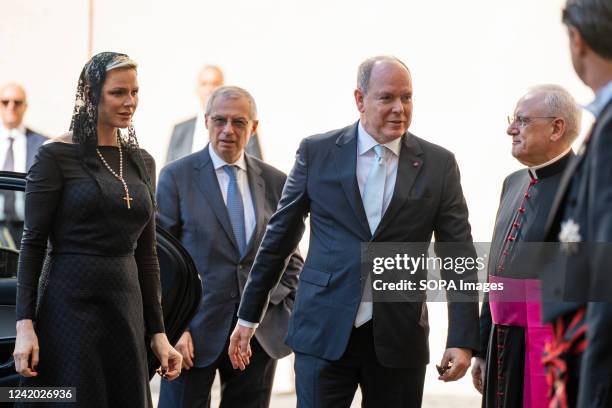 Prince Albert II and Princess Charlene are welcomed by Monsignor Leonardo Sapienza as they arrive at the Apostolic Palace. Pope Francis receives...