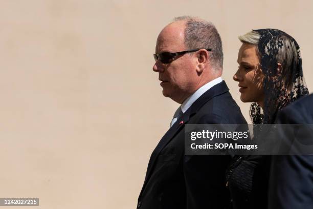 Prince Albert II and Princess Charlene walk through the San Damaso courtyard after their private audience with Pope Francis. Pope Francis receives...