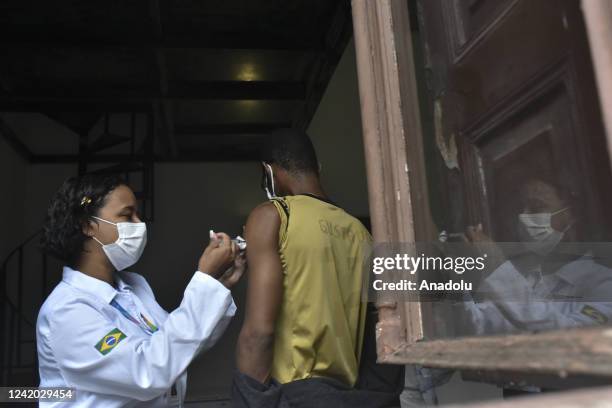 People are getting vaccinated against Covid -19, at the Heitor Beltrao health unit, central area of the city, in Rio de Janeiro, Brazil on July 20,...