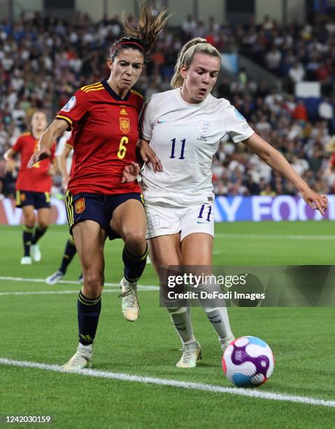 Aitana Bonmati of Spain and Lauren Hemp of England battle for the ball during the UEFA Women's Euro England 2022 Quarter Final match between England...