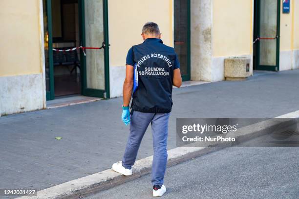 Forensic police during the scene of the attack in Rieti, Italy, on 20 July 2022.