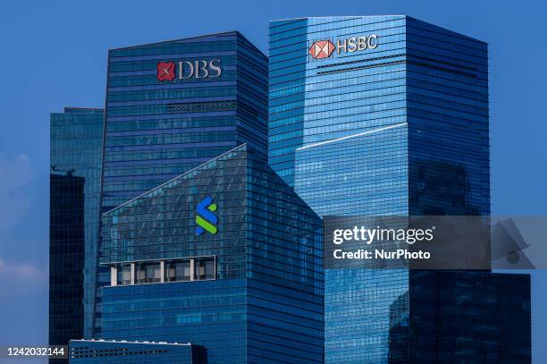 The offices of DBS Bank, HSBC Bank and Standard Charted Bank in Singapore's Marina Bay Financial District on Thursday, 21 July, 2022.