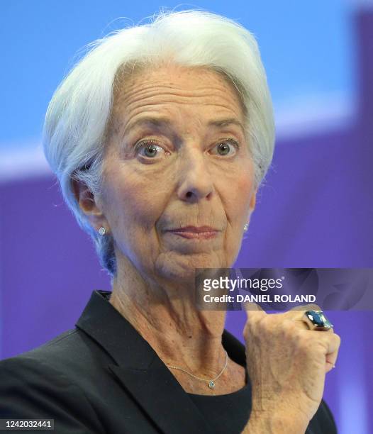Christine Lagarde, President of the European Central Bank reacts as she holds a press conference on eurozone monetary policy following the meeting of...