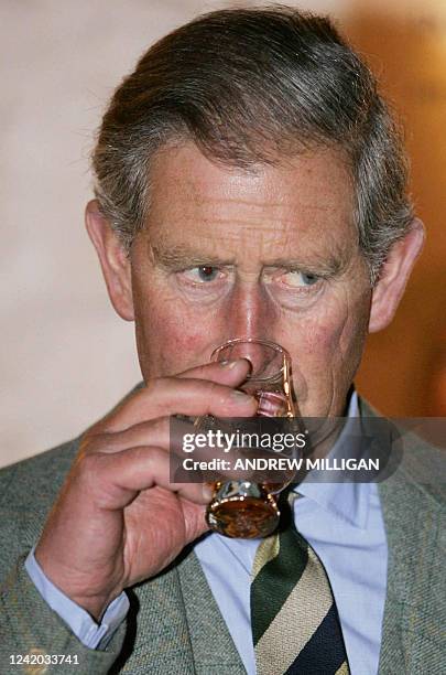 Prince Charles, the Duke of Rothesay, tastes a sixteen year old malt at the Pulteney Distillery in Wick, Scotland, 01 August ,2005. The Prince...