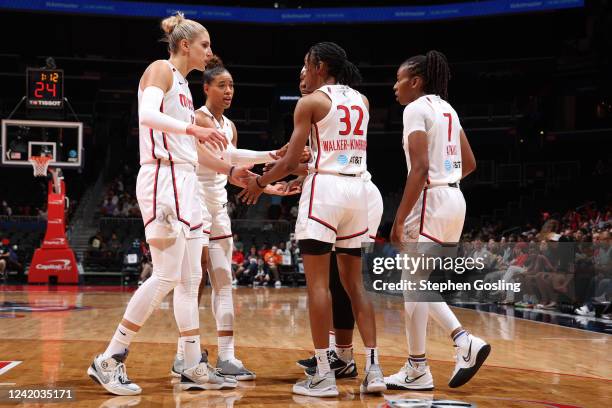 The players of the Washington Mystics huddle up during the game against the New York Liberty on July 21, 2022 at Capital One Arena in Washington, DC....