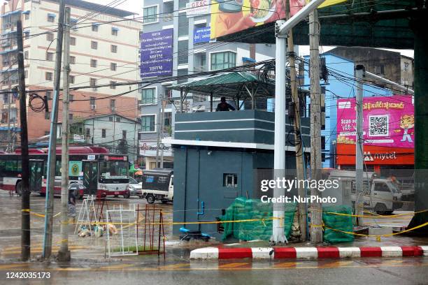 Member of the Myanmar security forces stands alert in his bunker in Yangon on July 21, 2022.