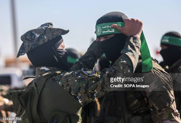 Members of the Izz al-Din al-Qassam Brigades, the military wing of Hamas, participate in an anti-Israel military parade in Gaza City.