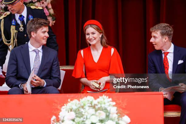 Princess Elisabeth of Belgium with her brothers Prince Emmanuel of Belgium and Prince Gabriel of Belgium pictured during the military parade for the...