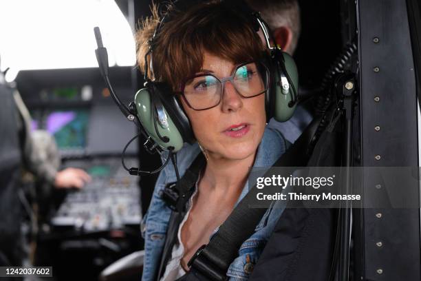 Beauvechain mayor Carole Ghiot is seen in a NH90 Helicoptere during the parade for the Belgium National Day on July 21, 2022 in Denderhoutem,...