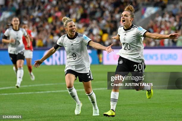 Germany's striker Lina Magull celebrates scoring her team's opening goal during the UEFA Women's Euro 2022 quarter final football match between...