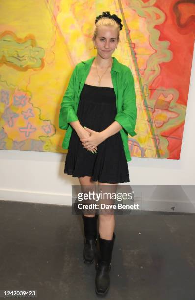 India Rose James attends a private view of "Through The Portal" by artists Coco Morris and Clare Davidson at Soho Revue on July 21, 2022 in London,...