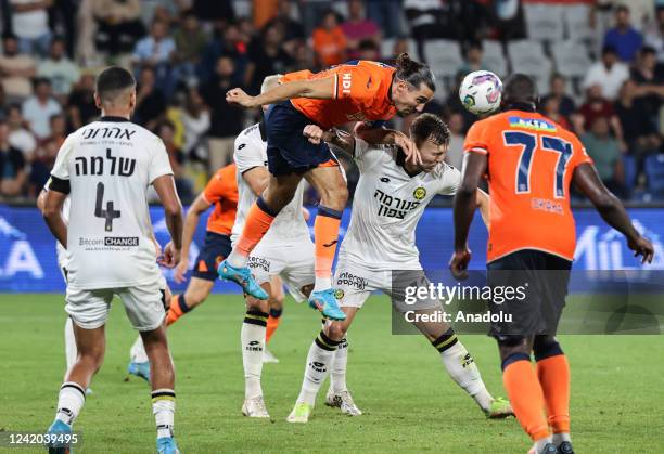 Enzo Crivelli of Medipol Basaksehir in action against Eden Karzev of Maccabi Netenya during UEFA Conference League second round qualifying first leg...