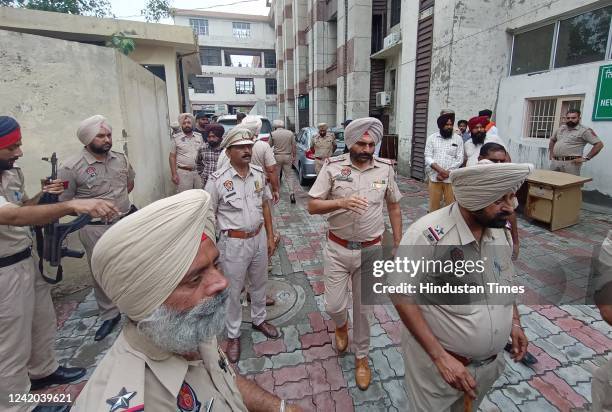 Punjab police personnel deployed at postmortem house of Amritsar civil hospital where the bodies of the two gangsters, who were allegedly involved in...