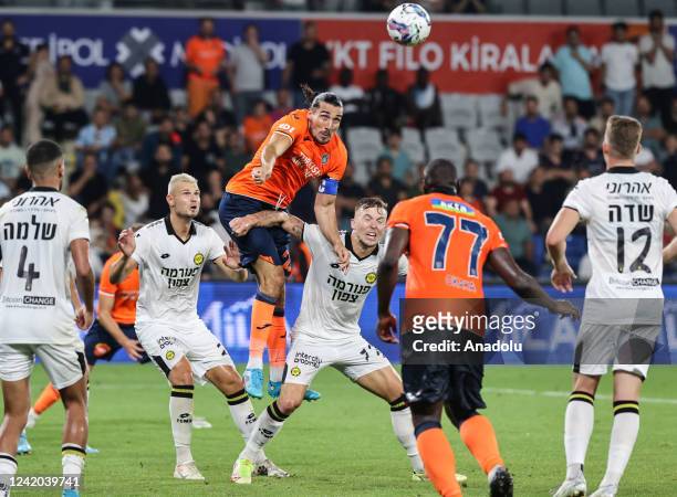 Enzo Crivelli of Medipol Basaksehir in action against Eden Karzev of Maccabi Netenya during UEFA Conference League second round qualifying first leg...