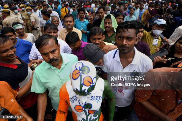 Supporter painted with All India Trinamool congress colors takes part during the Rally. The 21st July Martyr's Day Rally is an annual mass rally...