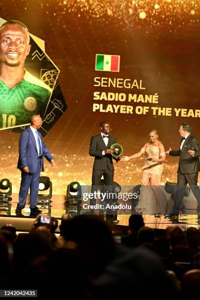 Patrice Motsepe, President of African Football Confederation gives title to Sadio Mane of Senegal after winning the African Footballer of the Year...