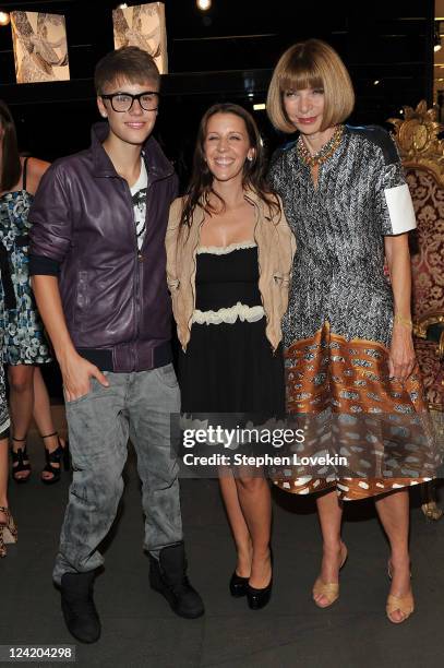 Justin Bieber, Pattie Mallette and Editor-In-Chief of American Vogue, Anna Wintour attend the Dolce & Gabbana celebration during Fashion's Night Out...