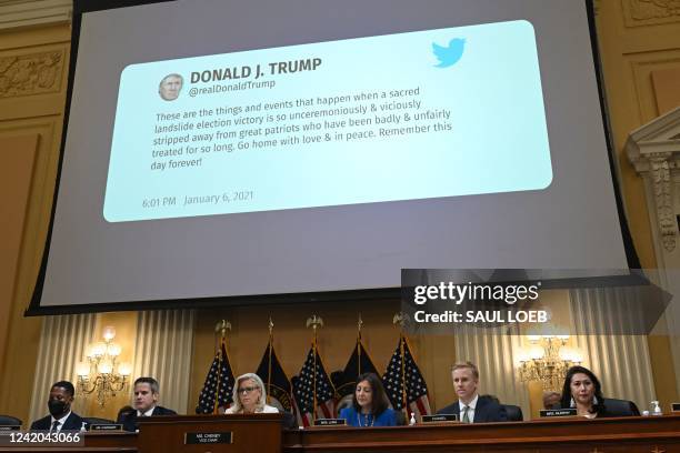 01pm tweet from Former President Donald Trump is displayed on screen during a hearing by the House Select Committee to investigate the January 6th...