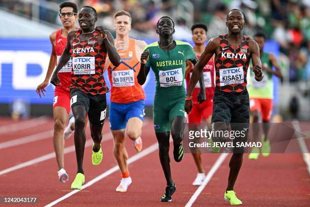 Kenya's Emmanuel Kipkurui Korir, Australia's Peter Bol and Kenya's Wyclife Kinyamal Kisasy run towards the finish line in the men's 800m semi-final...