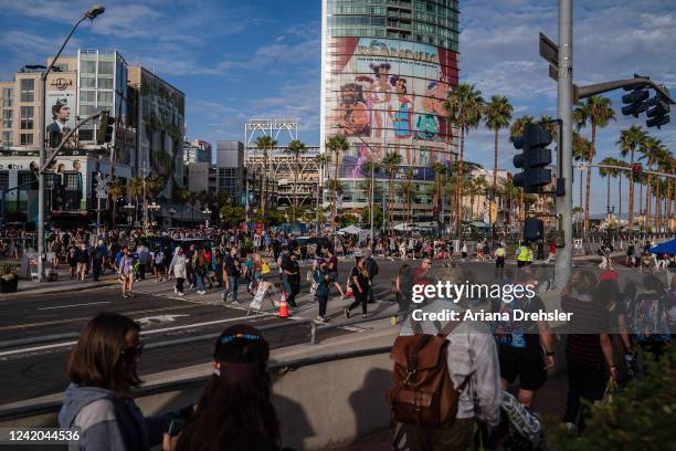 People walk near the San Diego Convention Center where Comic Con is being held on July 21, 2022 in San Diego, California.