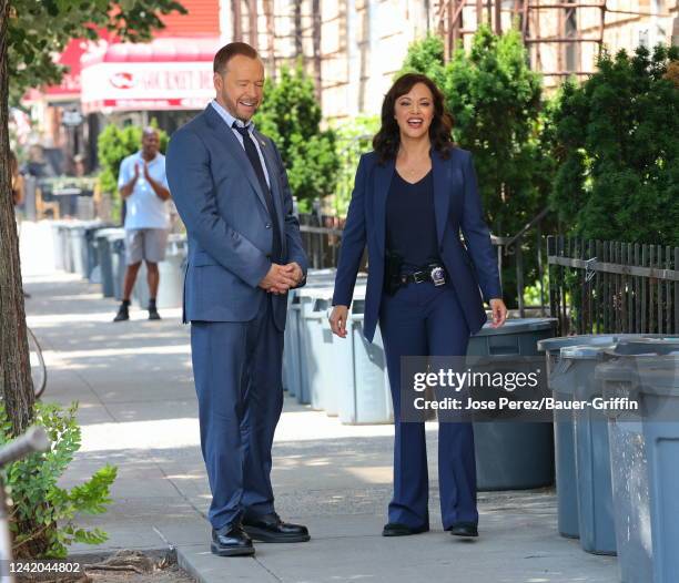 Donnie Wahlberg and Marisa Ramirez are seen on the set of "Blue Bloods" on July 21, 2022 in New York City.