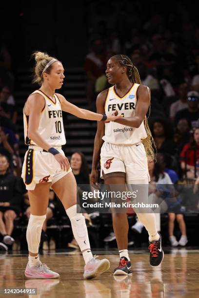 Lexie Hull of the Indiana Fever high fives Queen Egbo of the Indiana Fever during the game against the Las Vegas Aces on July 21, 2022 at Michelob...