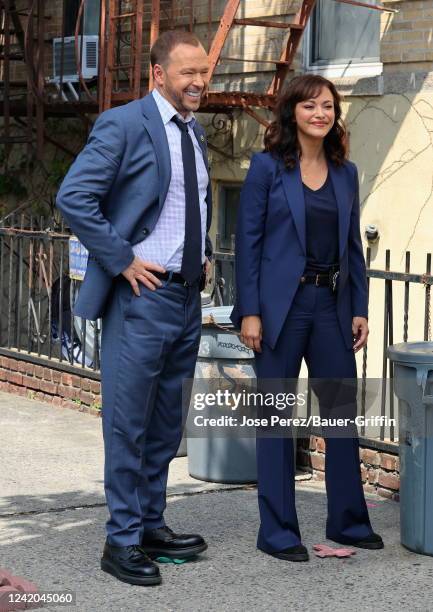Donnie Wahlberg and Marisa Ramirez are seen on the set of "Blue Bloods" on July 21, 2022 in New York City.