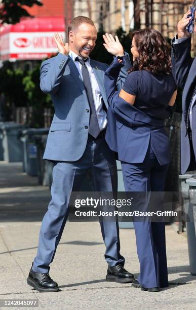 Donnie Wahlberg and Marisa Ramirez are seen on the set of "Blue Bloods" on July 21, 2022 in New York City.