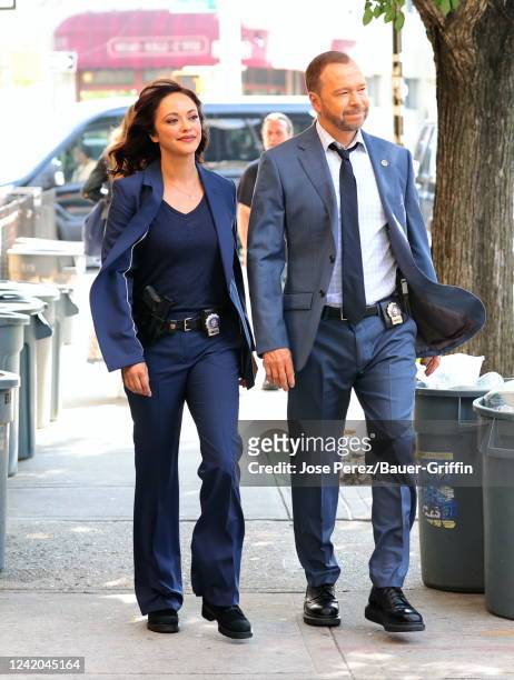 Marisa Ramirez and Donnie Wahlberg are seen on the set of "Blue Bloods" on July 21, 2022 in New York City.